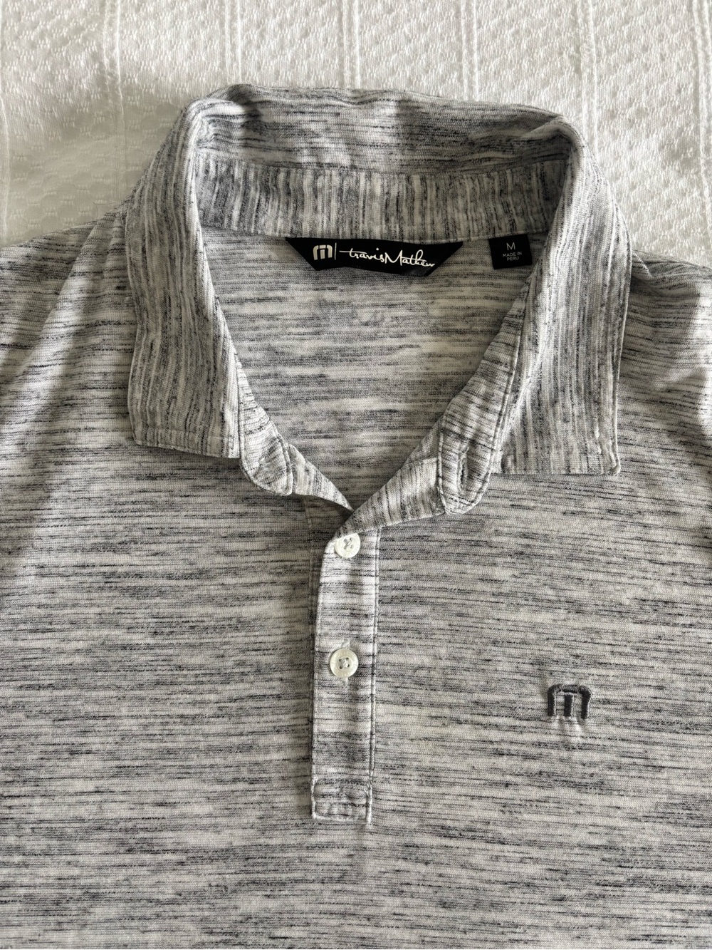 Travis Mathew Heathered Light Gray Polo with Subtle Logo
